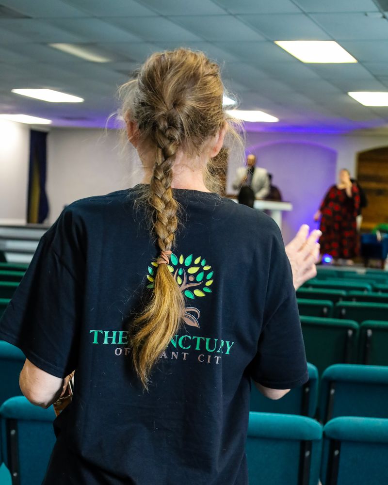 Members worshipping together during a service